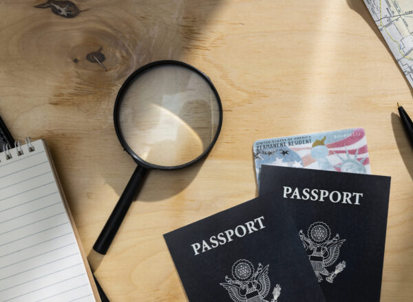 flat-lay-green-cards-passports